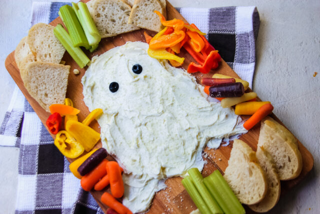 Butter board with butter shaped like a ghost for halloween